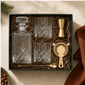 Home bar gift box with crystal glassware and brass tools